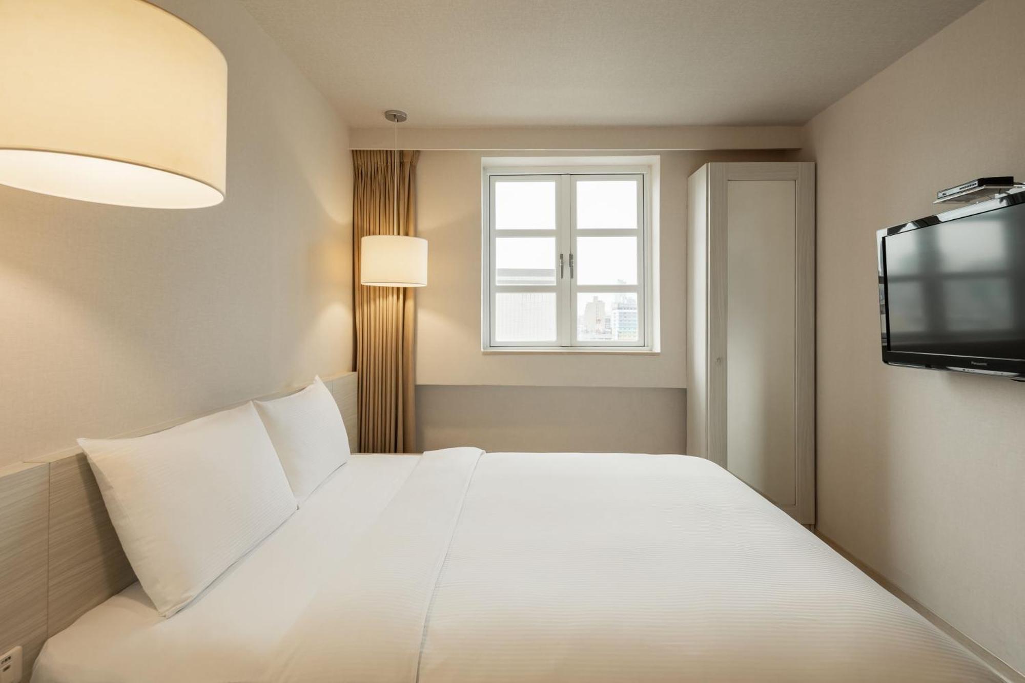 Kindness Hotel - Houyi Jiuru Kaohsiung Oda fotoğraf